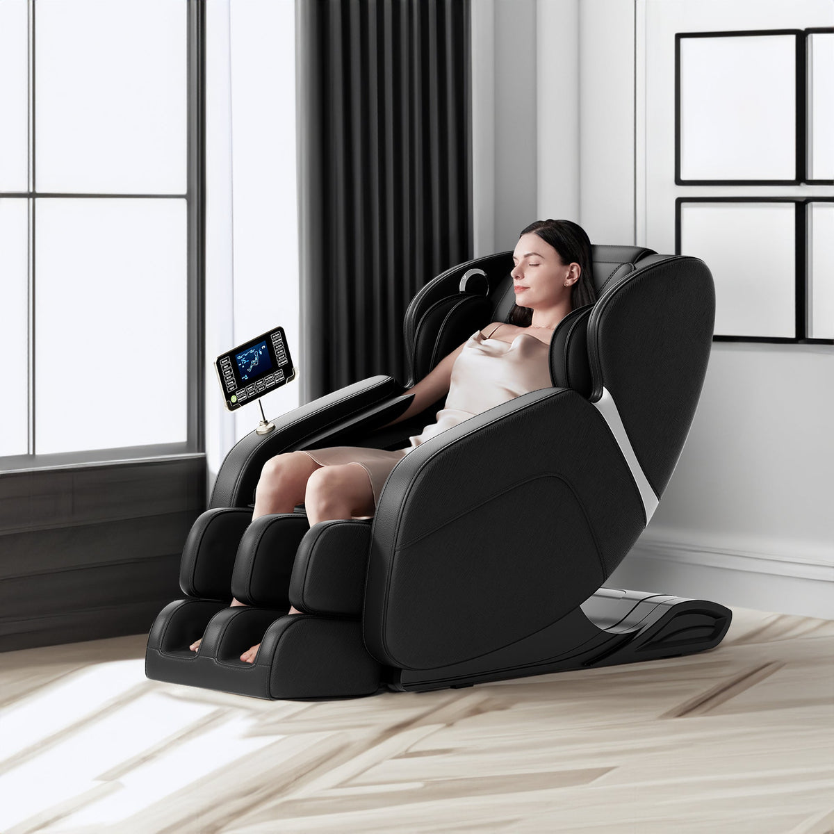 Black full-body massage chair with touchscreen and foot rollers, supplier photograph